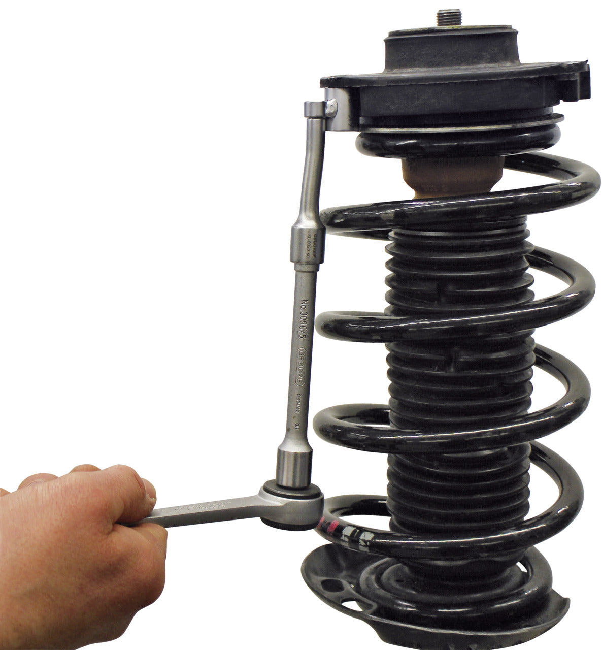 KL-0050-60 - Soporte especial para puntal, VW, 13mm (waf): Mano usa llave articulada larga sobre amortiguador