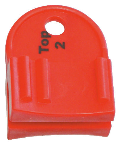 KL-0482-302 - Herramienta de bloqueo para NW 1.4 y 1.6: Pieza plástica roja con orificio circular y marca 'Top 2' en relieve