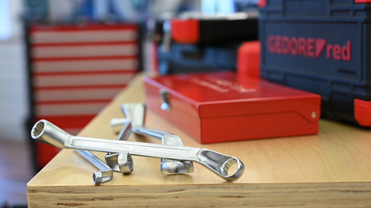 Llave estrella doble acodada