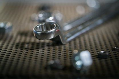 Llave estrella doble acodada