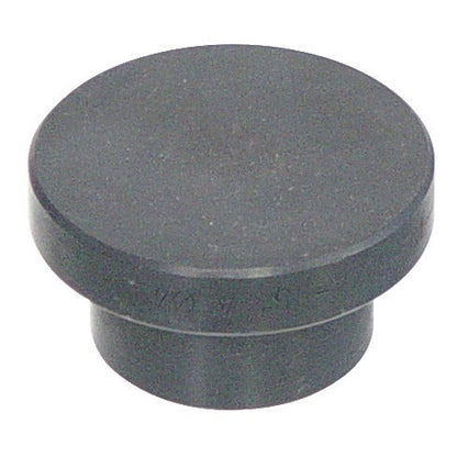 KL-0174-854 - Pieza de presión para cubos de rueda: Pieza cilíndrica negra con reborde escalonado y superficie superior plana